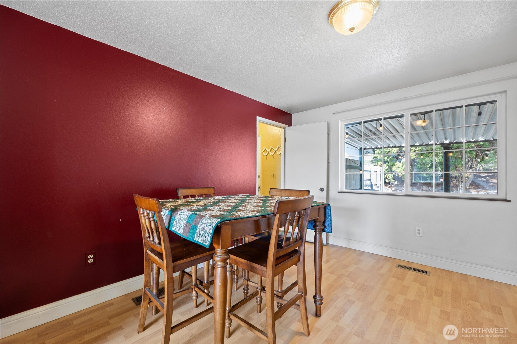 705 North 12th Street Selah, WA 98942 - Photo 14 of 32 a view of a dining room with furniture and window