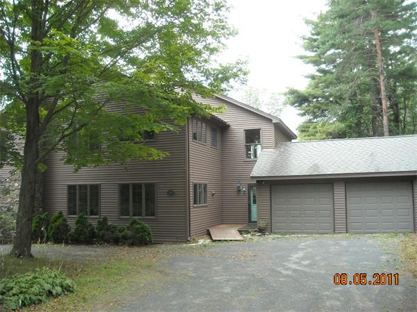 375 Kinnebrook Road Worthington, MA 01098 - Photo 4 of 12 a view of house with outdoor space and yard