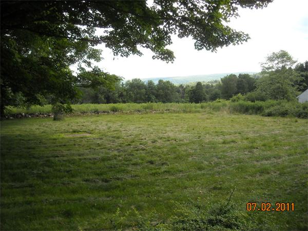 375 Kinnebrook Road Worthington, MA 01098 - Photo 5 of 12 a view of outdoor space with green field and trees all around