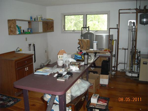 375 Kinnebrook Road Worthington, MA 01098 - Photo 6 of 12 a view of a workspace with furniture and a window