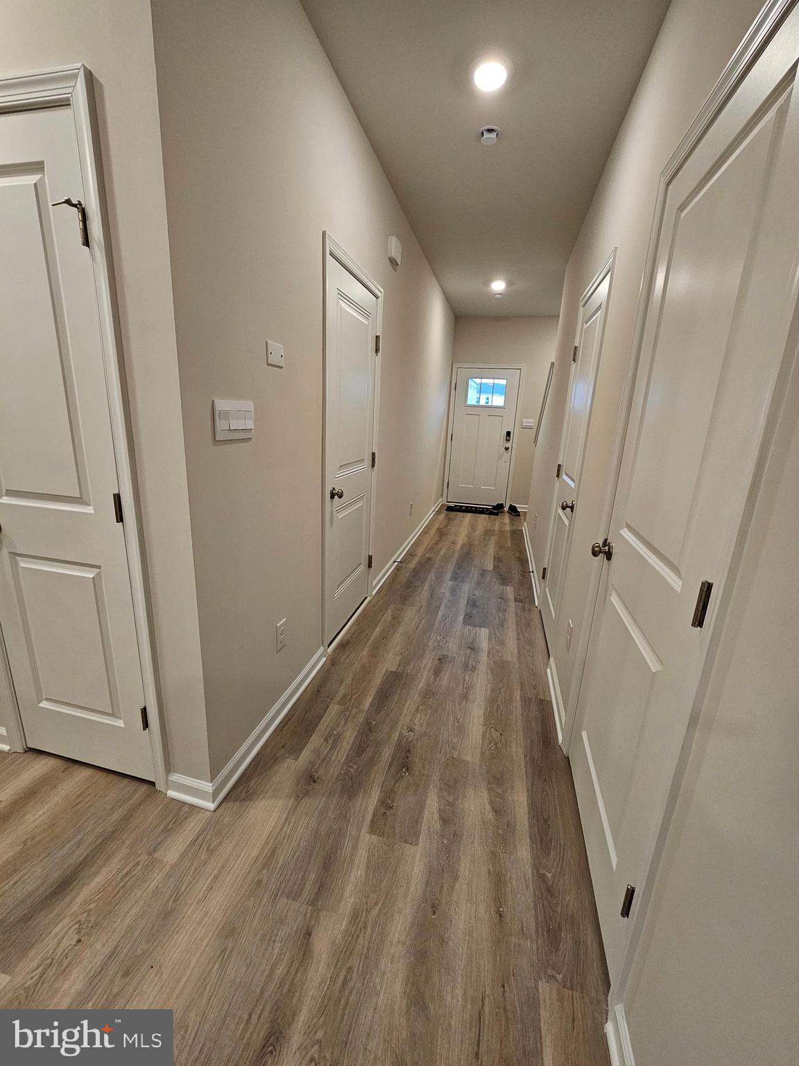 21 Alexander Way Westampton, NJ 08060 - Photo 3 of 25 a view of a hallway with wooden floor