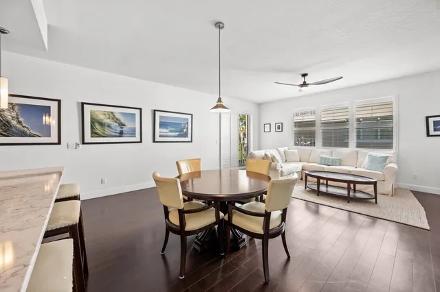 a dining room with furniture window wooden floor