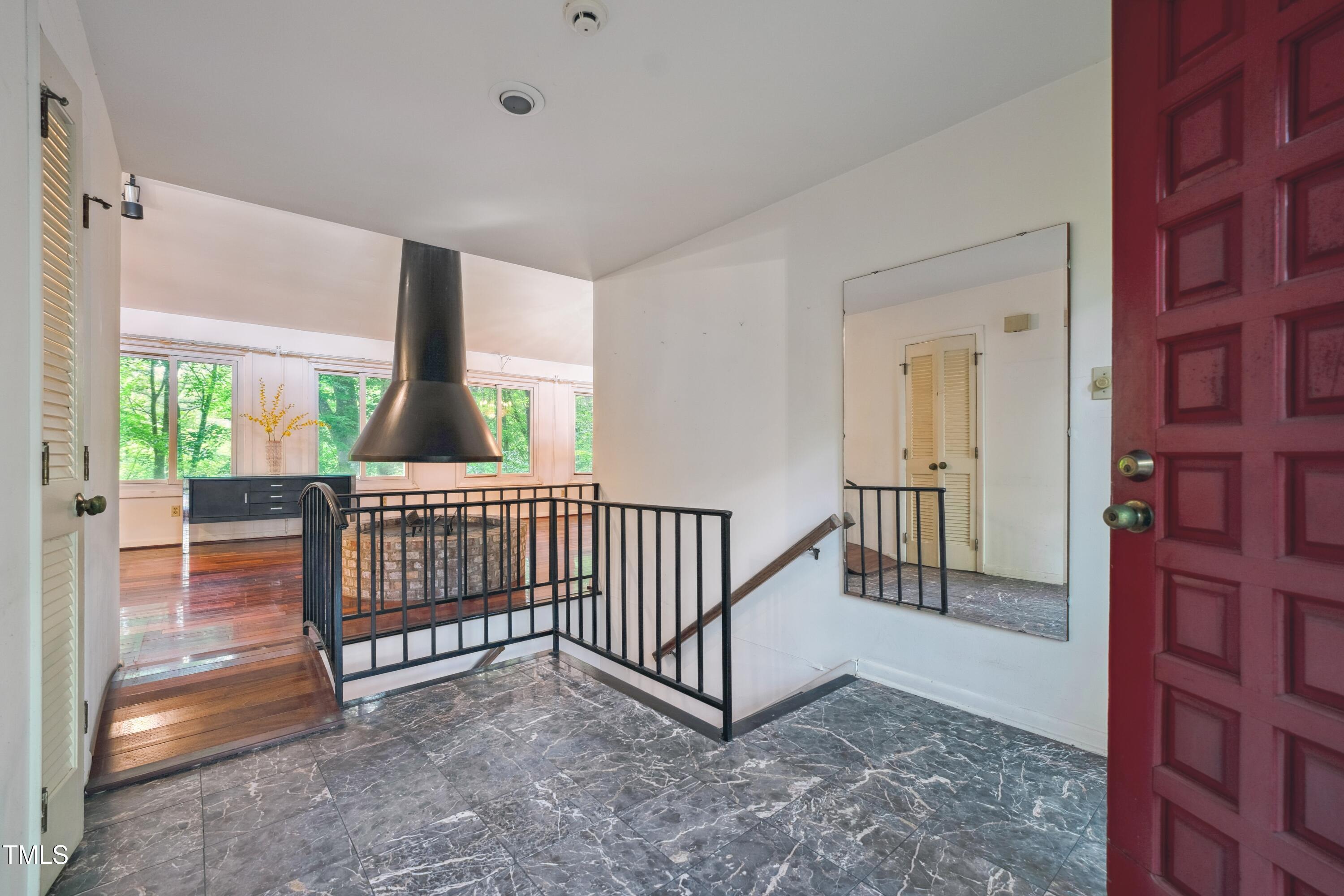 3416 Ocotea Street Raleigh, NC 27607 - Photo 11 of 46 a view of livingroom with furniture and staircase
