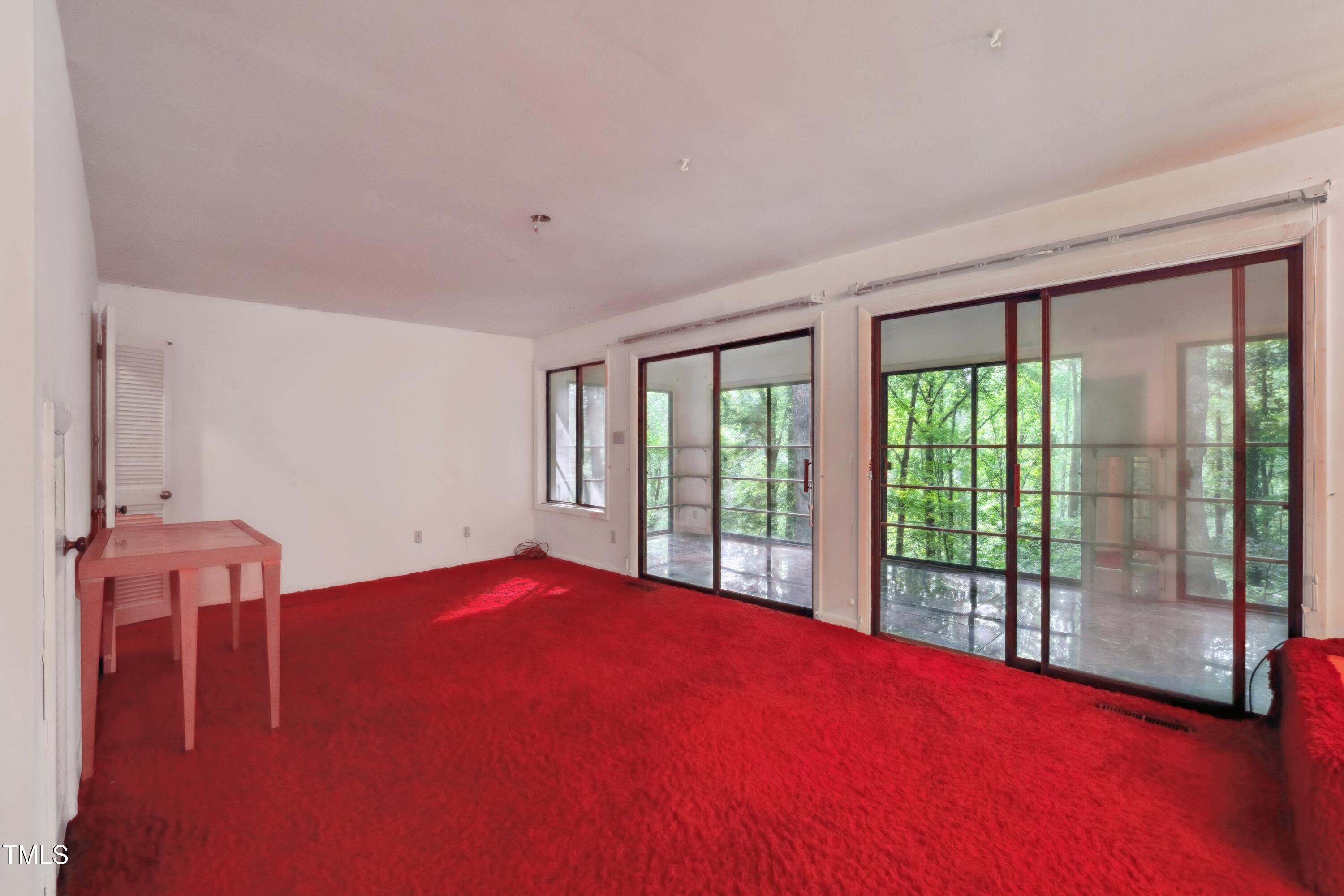 3416 Ocotea Street Raleigh, NC 27607 - Photo 22 of 46 a view of an empty room with a window