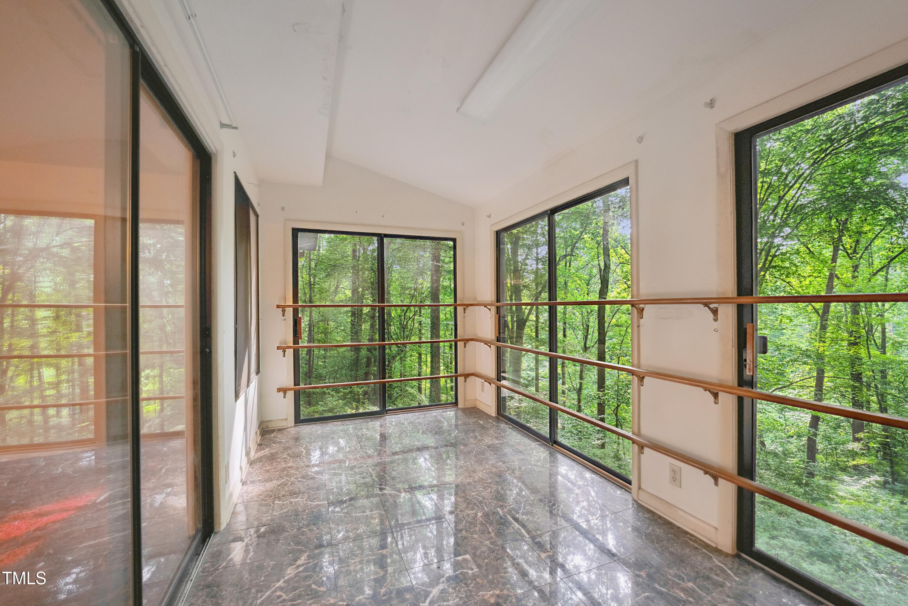 3416 Ocotea Street Raleigh, NC 27607 - Photo 31 of 46 a view of a room with a large window