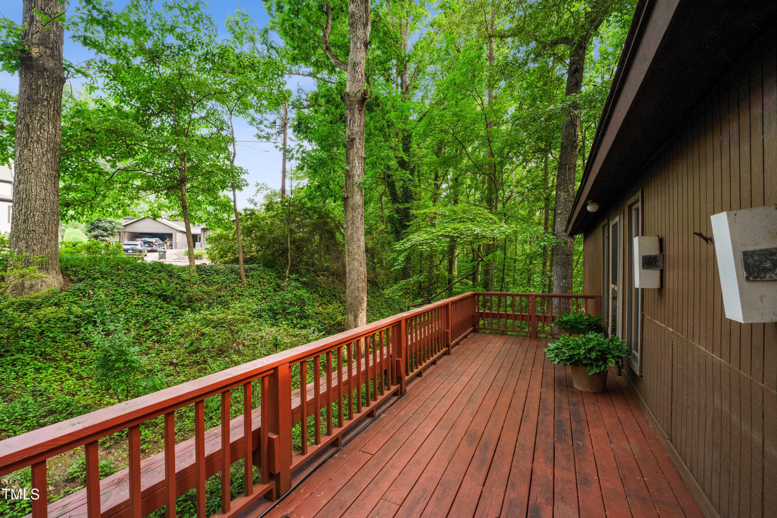 3416 Ocotea Street Raleigh, NC 27607 - Photo 41 of 46 a view of a balcony with wooden floor