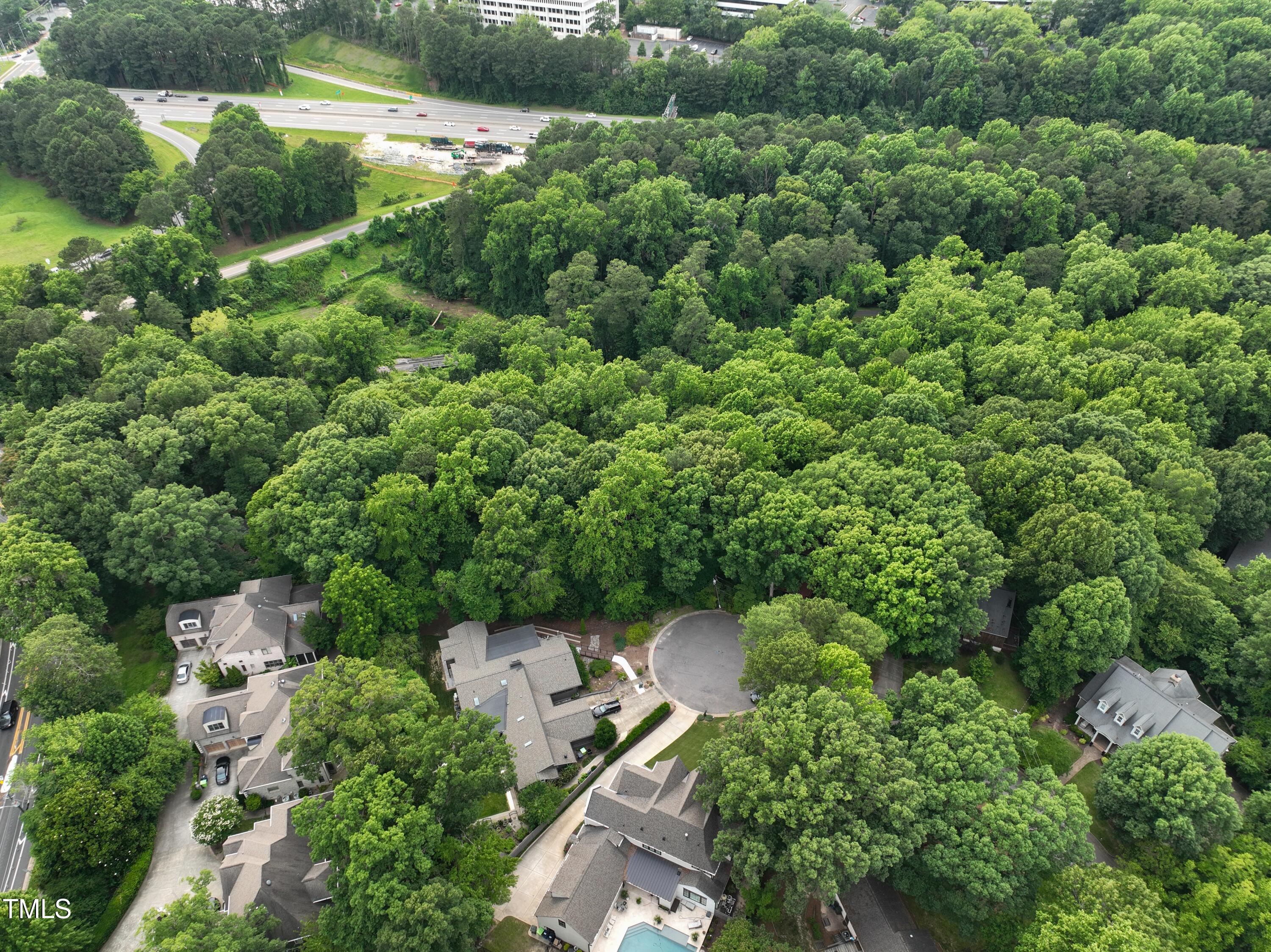 3416 Ocotea Street Raleigh, NC 27607 - Photo 45 of 46 an aerial view of a house with a yard