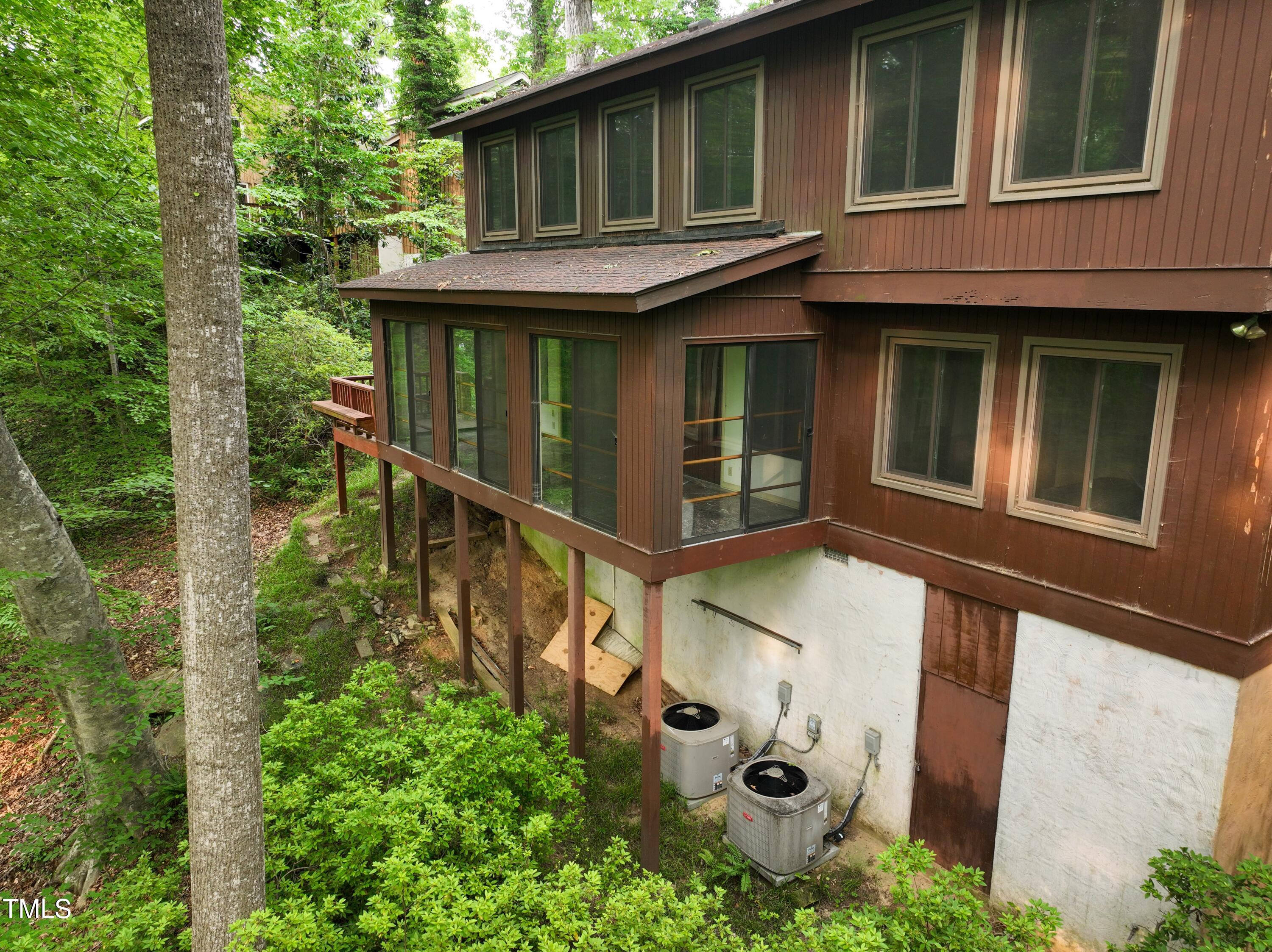 3416 Ocotea Street Raleigh, NC 27607 - Photo 6 of 46 a front view of a house with plants