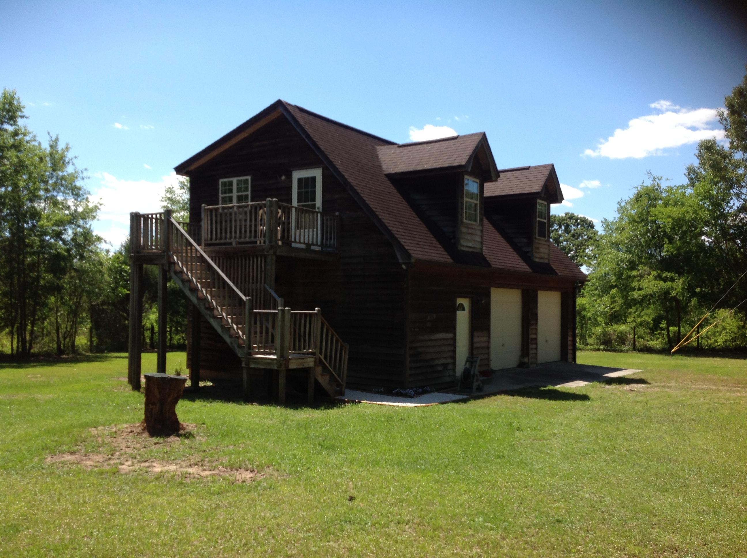 1189 Gardensgate Road Eutawville, SC 29048 - Photo 4 of 36 Side view of porch/deck