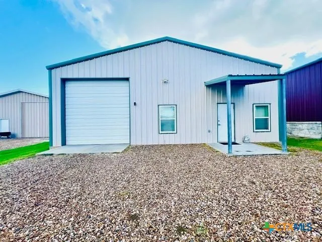 a house view with a backyard space