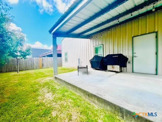 a house view with swimming pool in front of it