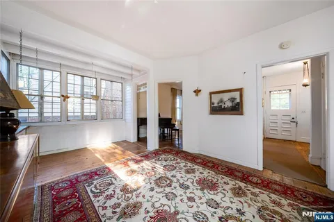 a bed room with a bed and a window