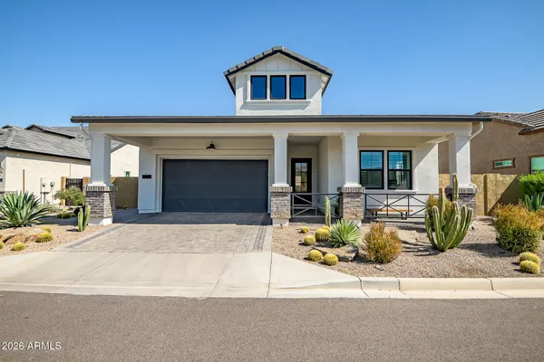 a view of a balcony with chairs