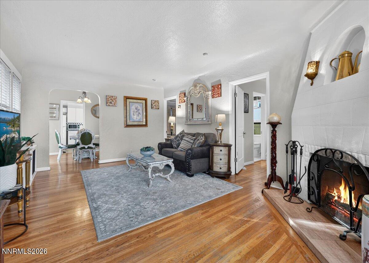 611 Nixon Avenue Reno, NV 89509 - Photo 3 of 43 a living room with furniture and a fireplace