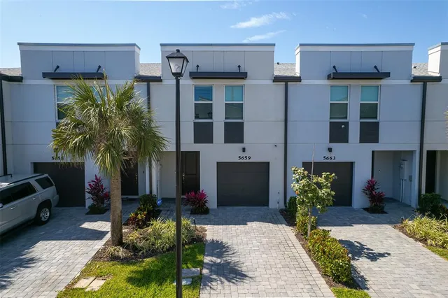 an aerial view of multiple house