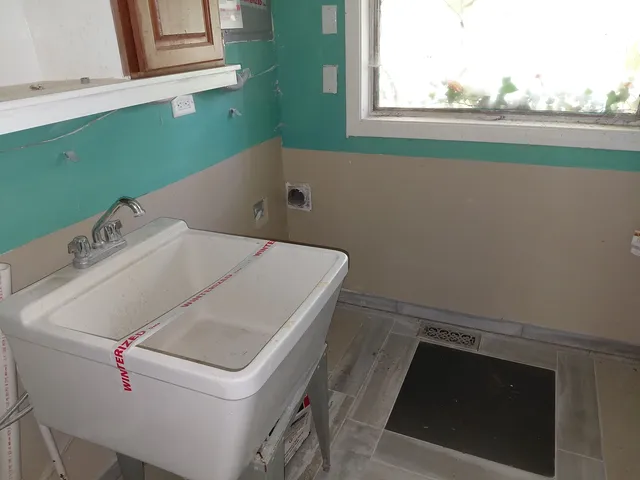 a utility room with a washer and dryer