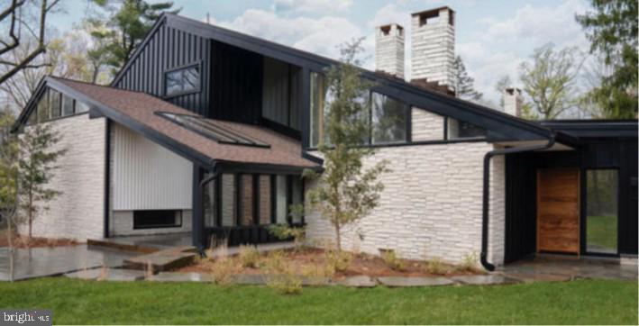 a backyard of a house with lots of green space