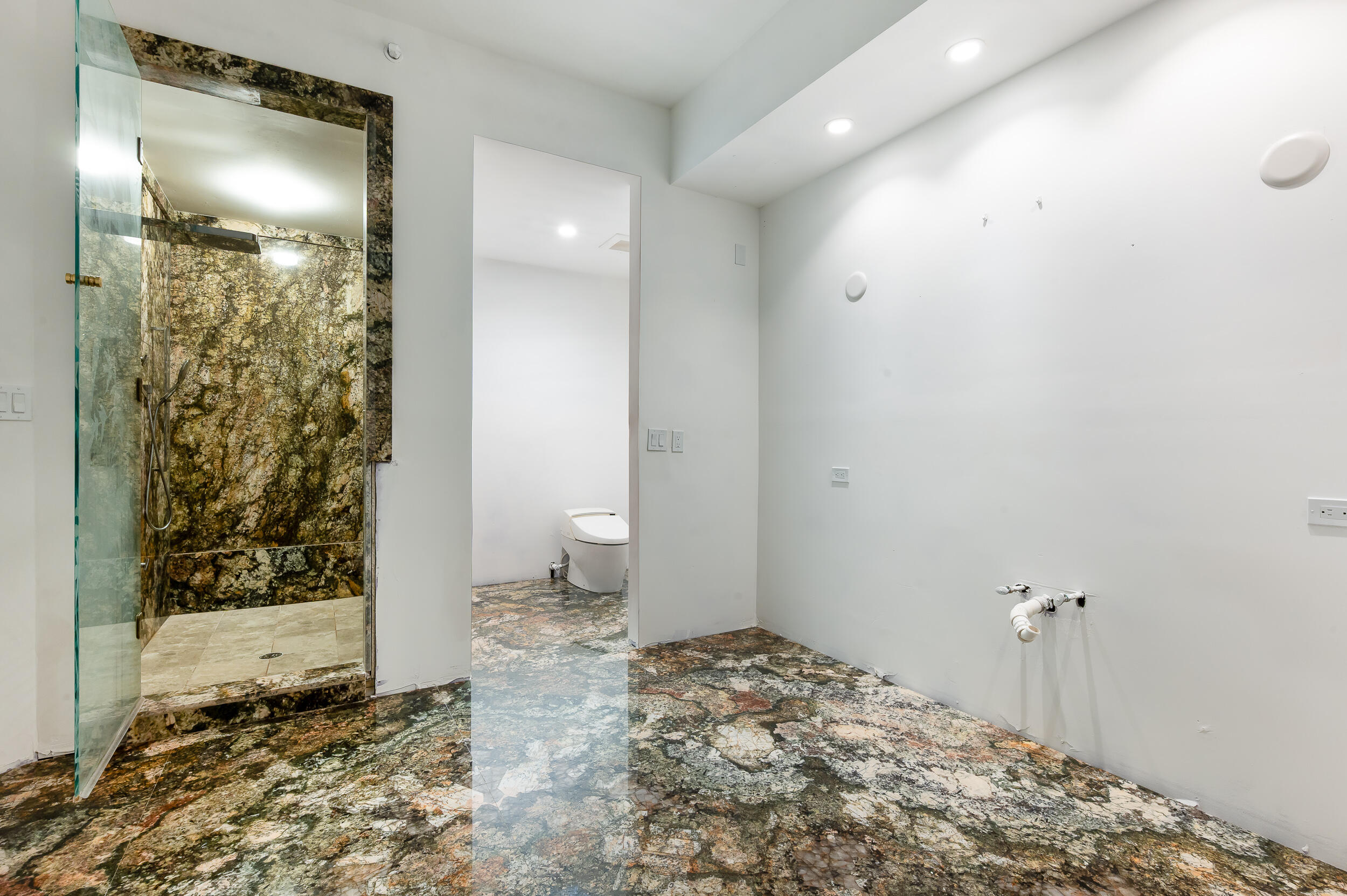 550 Southeast 5th Avenue, Unit 606S Boca Raton, FL 33432 - Photo 11 of 38 a bathroom with a sink and a shower