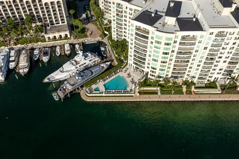 a view of a balcony with chairs