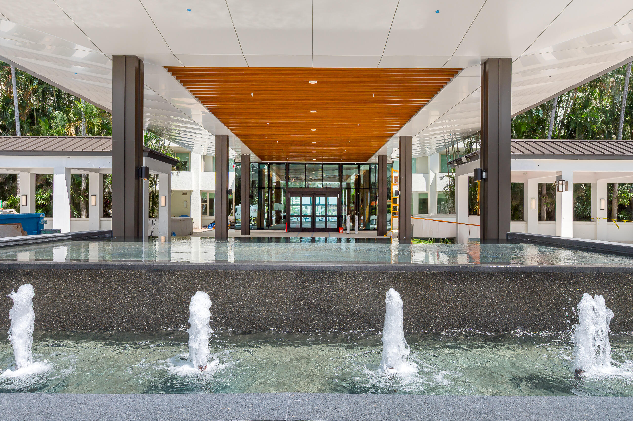 550 Southeast 5th Avenue, Unit 606S Boca Raton, FL 33432 - Photo 24 of 38 a front view of a house with a yard