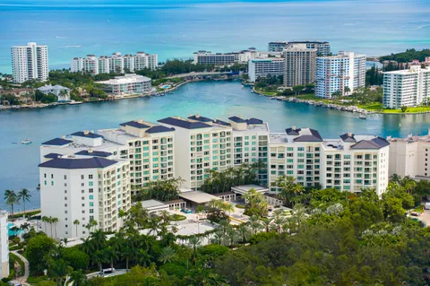 a view of a lake with tall building