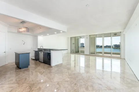 a view of a kitchen with a sink