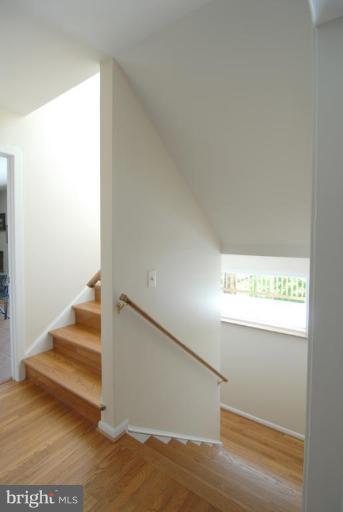 10929 Beach Mill Road Great Falls, VA 22066 - Photo 24 of 27 Staircase to lower level