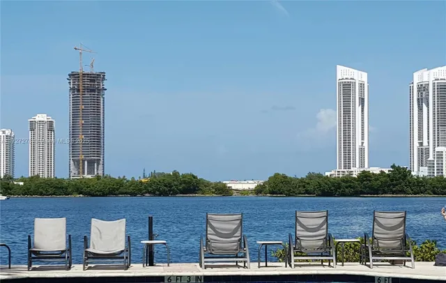 a view of building with outdoor space and seating area