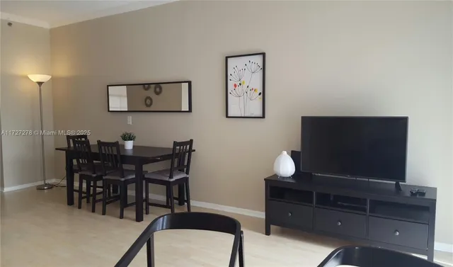 a view of a livingroom with furniture