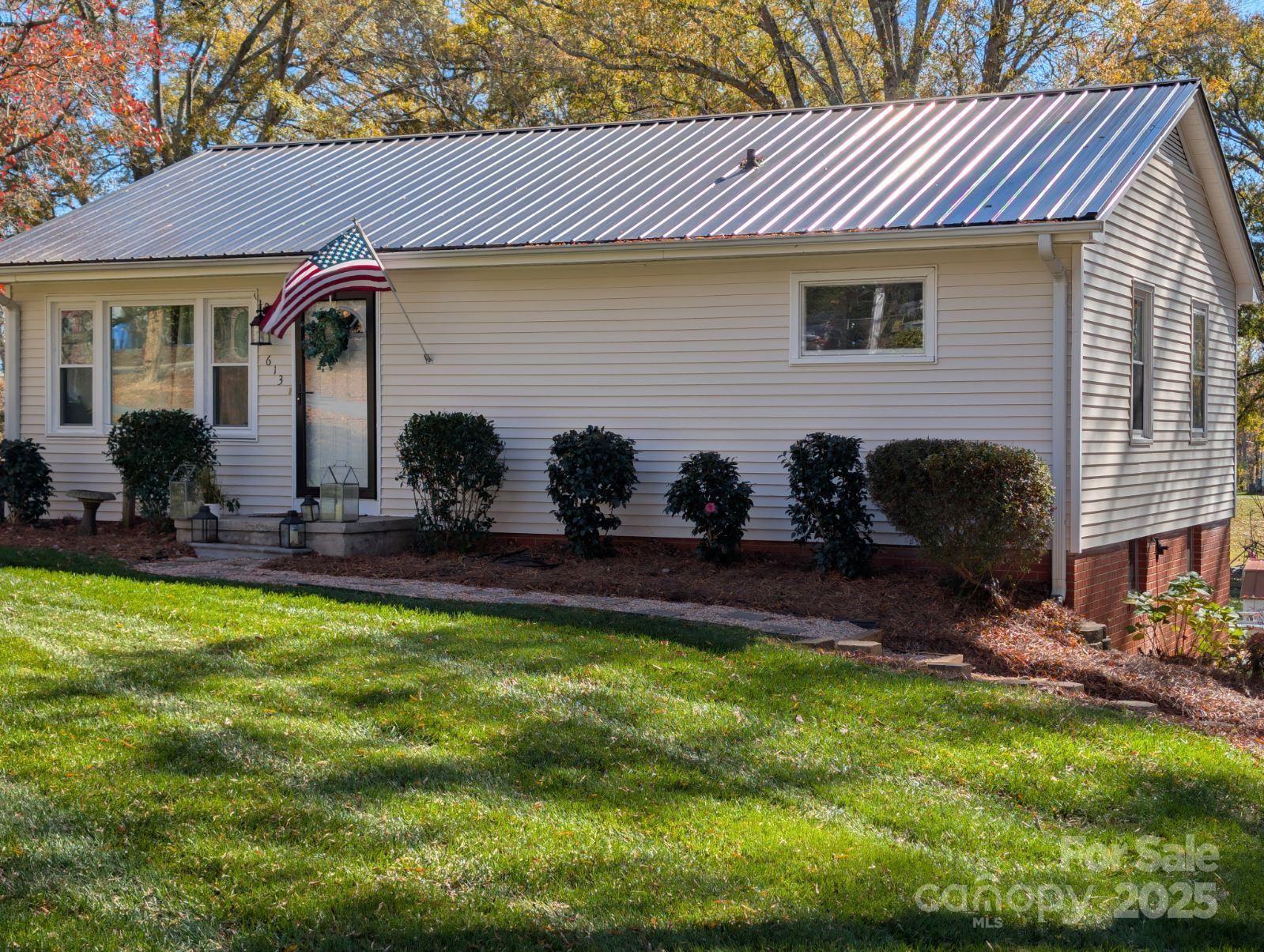 613 Gurley Street Albemarle, NC 28001 - Photo 2 of 43 a view of a house with backyard