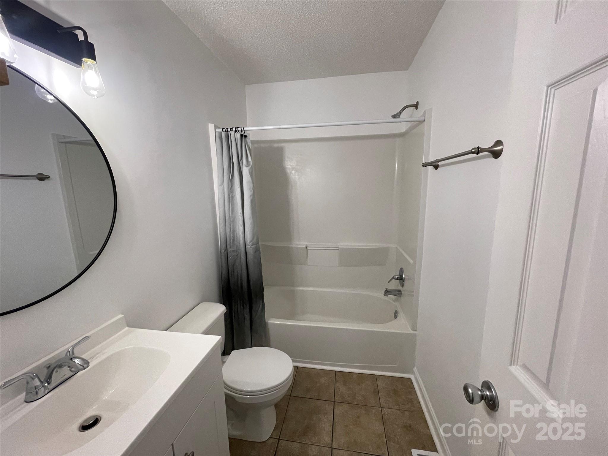 613 Gurley Street Albemarle, NC 28001 - Photo 23 of 43 a bathroom with a sink toilet and shower