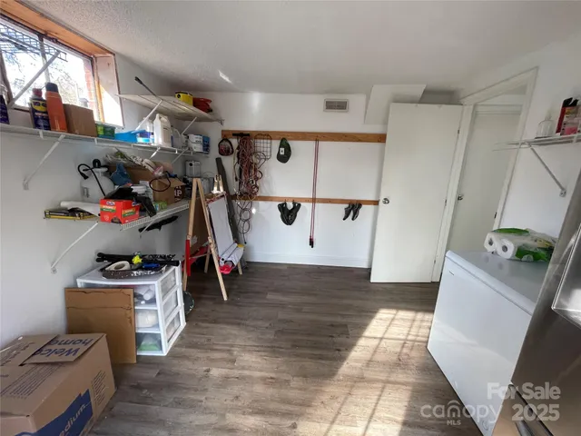 a view of room with shelves