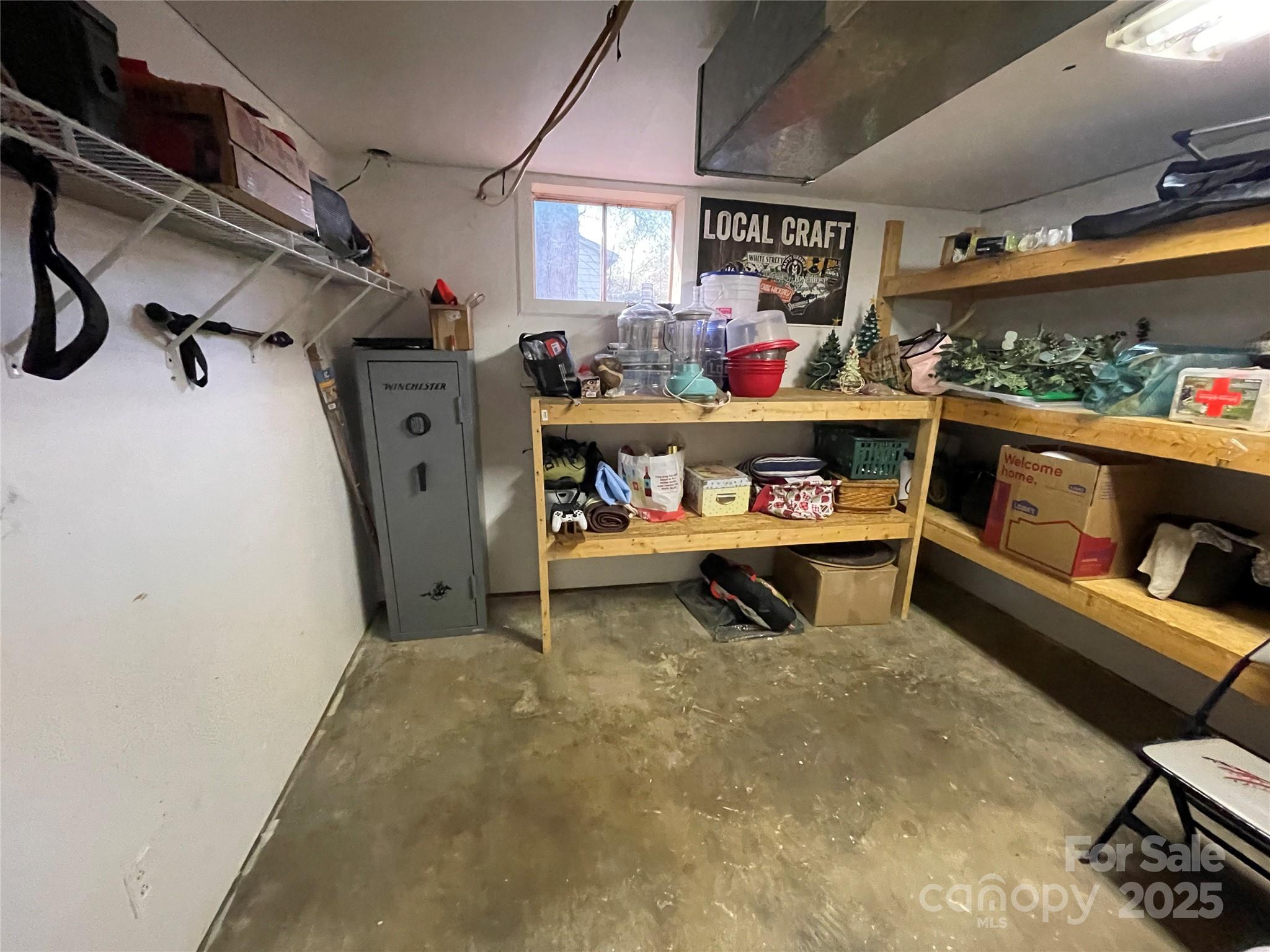 613 Gurley Street Albemarle, NC 28001 - Photo 34 of 43 a view of room with shelves