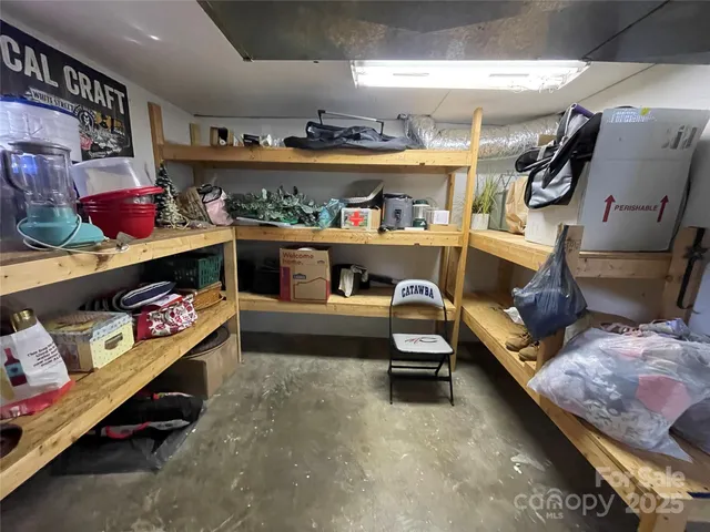 a view of a house with a backyard and a patio