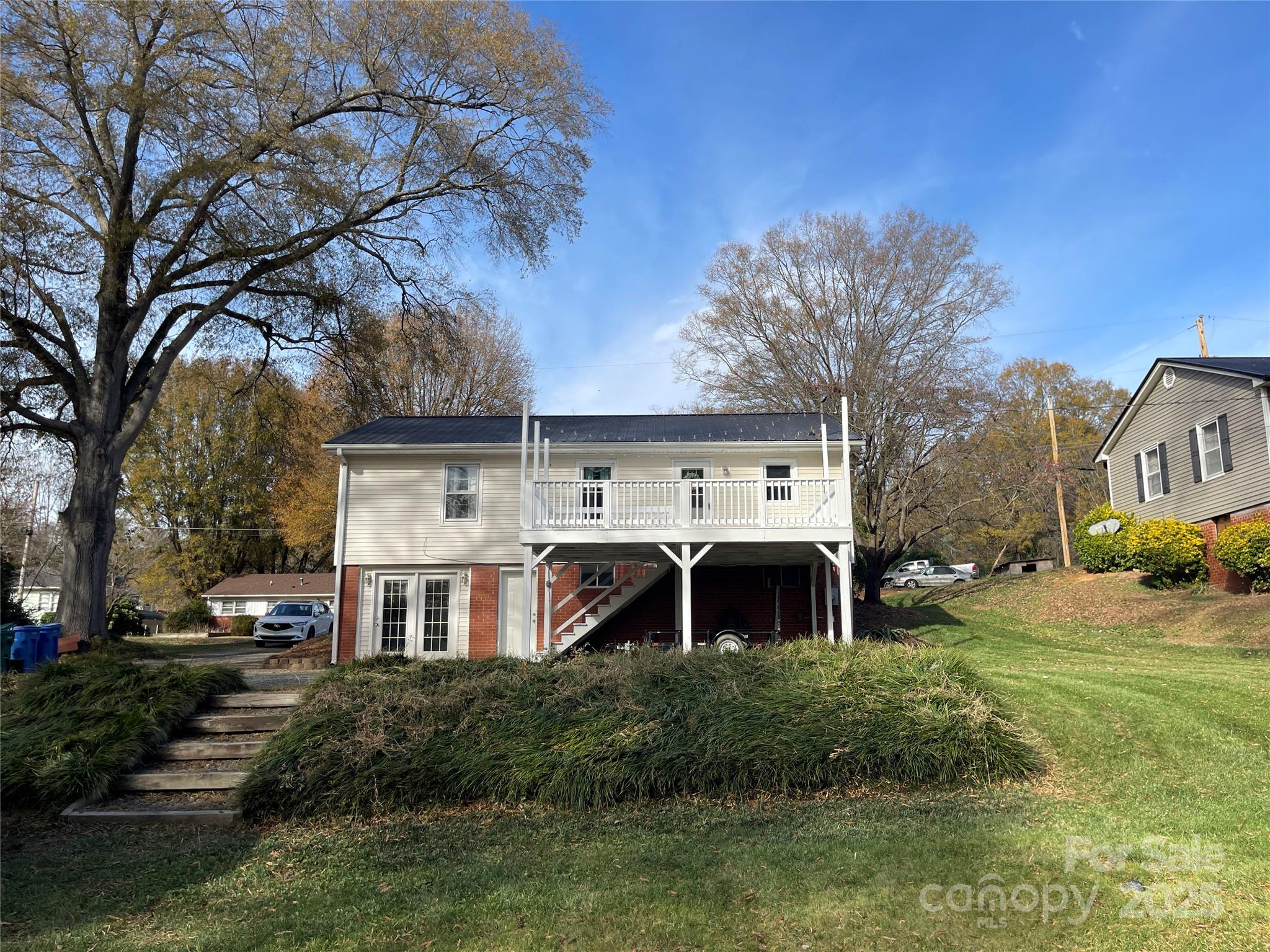 613 Gurley Street Albemarle, NC 28001 - Photo 39 of 43 a view of a house with a yard