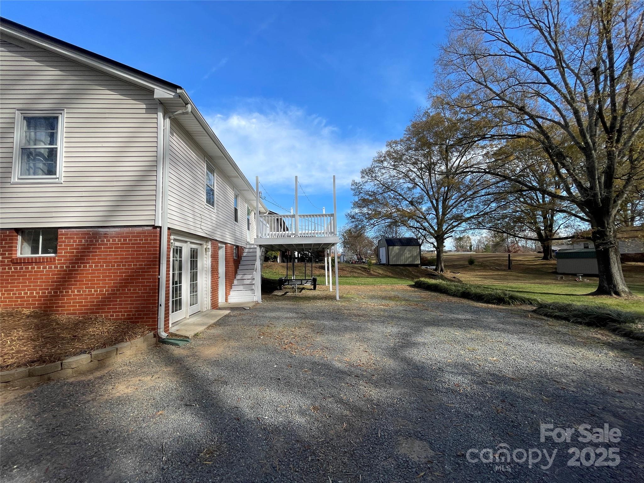 613 Gurley Street Albemarle, NC 28001 - Photo 40 of 43 a view of a house with a yard