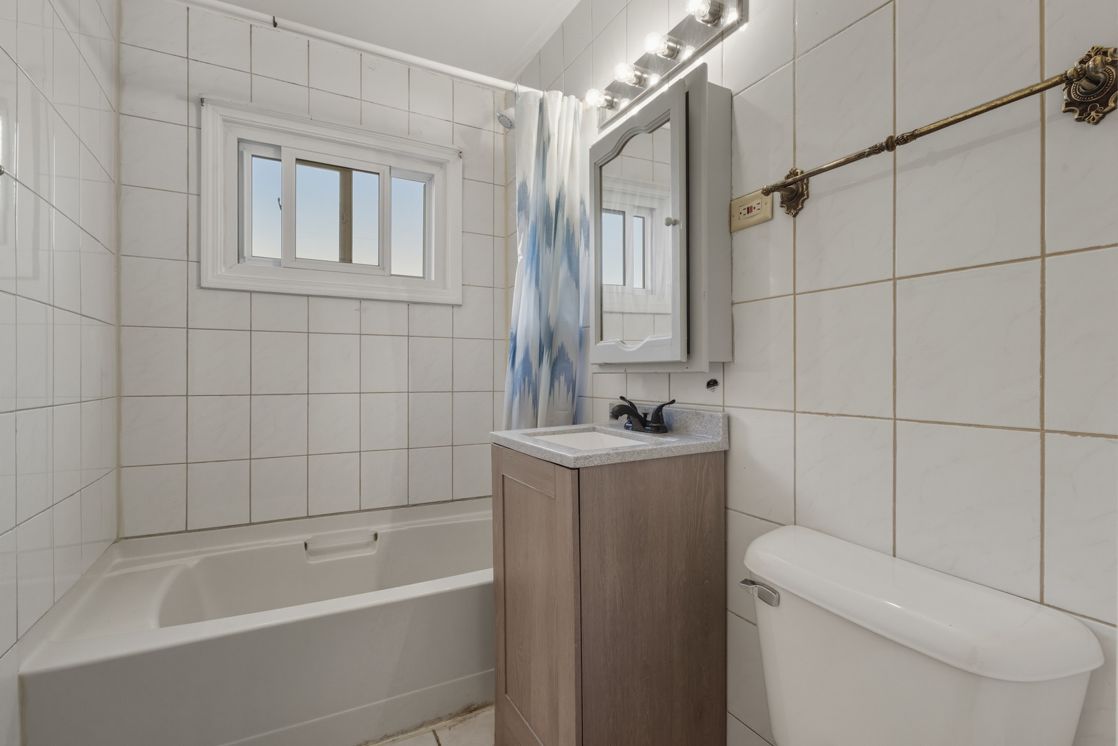 11013 Menard Avenue Chicago Ridge, IL 60415 - Photo 28 of 40 a bathroom with a sink a toilet and shower