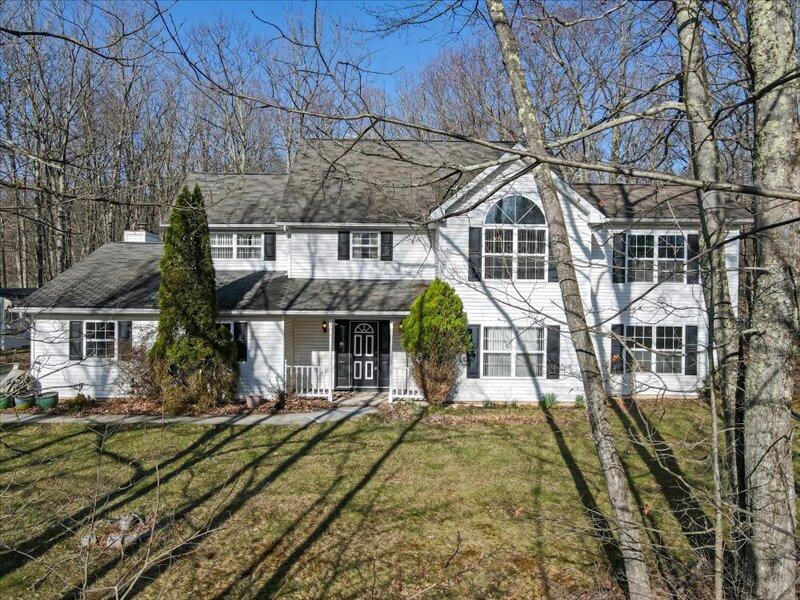 1135 Juno Drive Effort, PA 18330 - Photo 2 of 68 a front view of a house with a yard