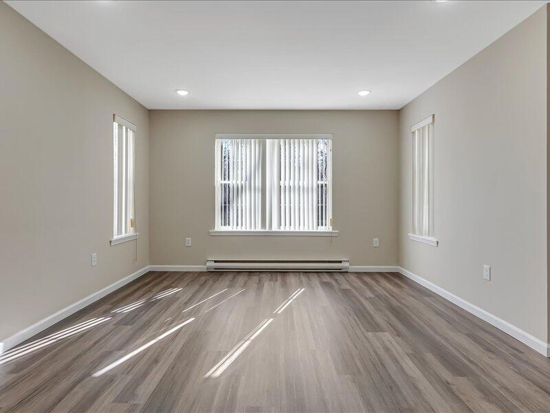 1135 Juno Drive Effort, PA 18330 - Photo 32 of 68 a view of an empty room with wooden floor and a window