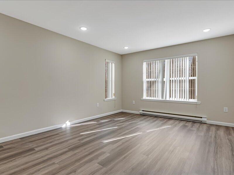 1135 Juno Drive Effort, PA 18330 - Photo 33 of 68 a view of an empty room with wooden floor and a window