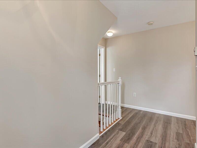 1135 Juno Drive Effort, PA 18330 - Photo 39 of 68 a view of a hallway with wooden floor