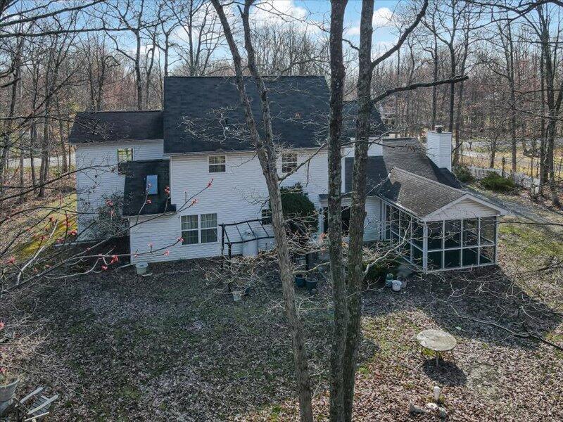 1135 Juno Drive Effort, PA 18330 - Photo 50 of 68 a view of a house with a yard