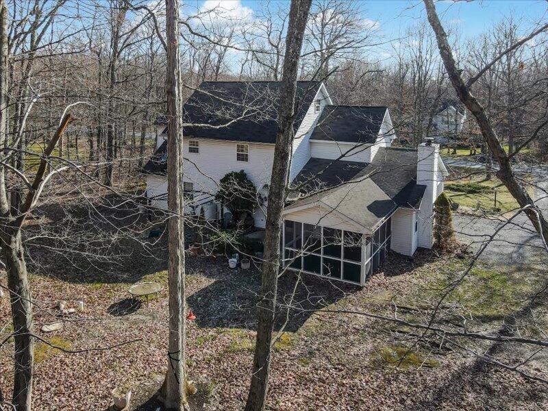 1135 Juno Drive Effort, PA 18330 - Photo 59 of 68 a view of a house with a yard and sitting area