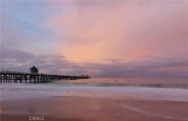 a view of swimming pool from a balcony