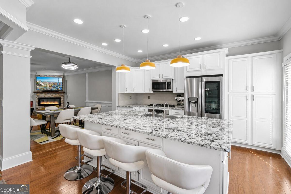 2872 Overlook Way Northeast Atlanta, GA 30324 - Photo 1 of 43 a kitchen with stainless steel appliances granite countertop a sink and a refrigerator