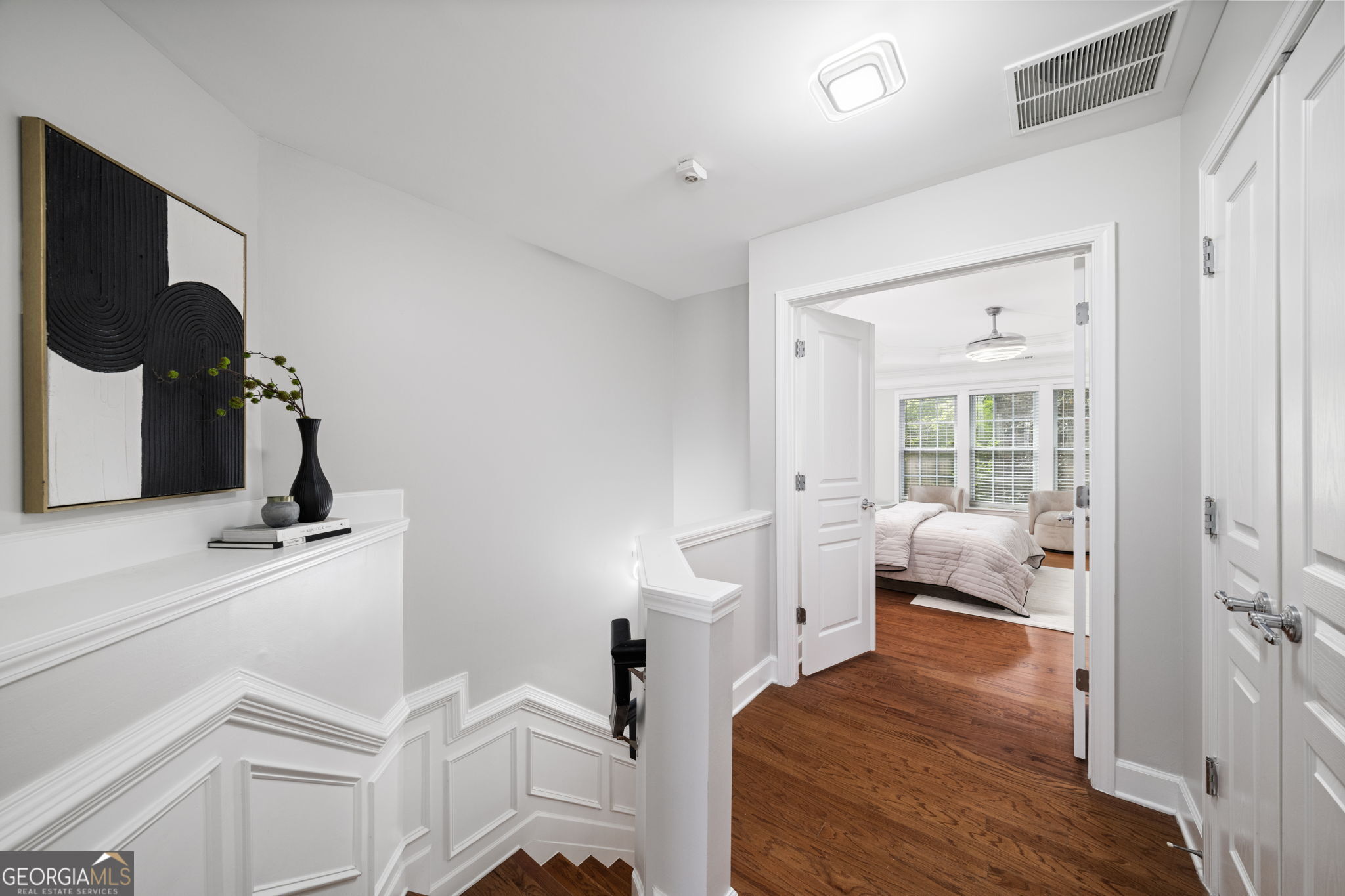 2872 Overlook Way Northeast Atlanta, GA 30324 - Photo 16 of 43 a bedroom with furniture and a window