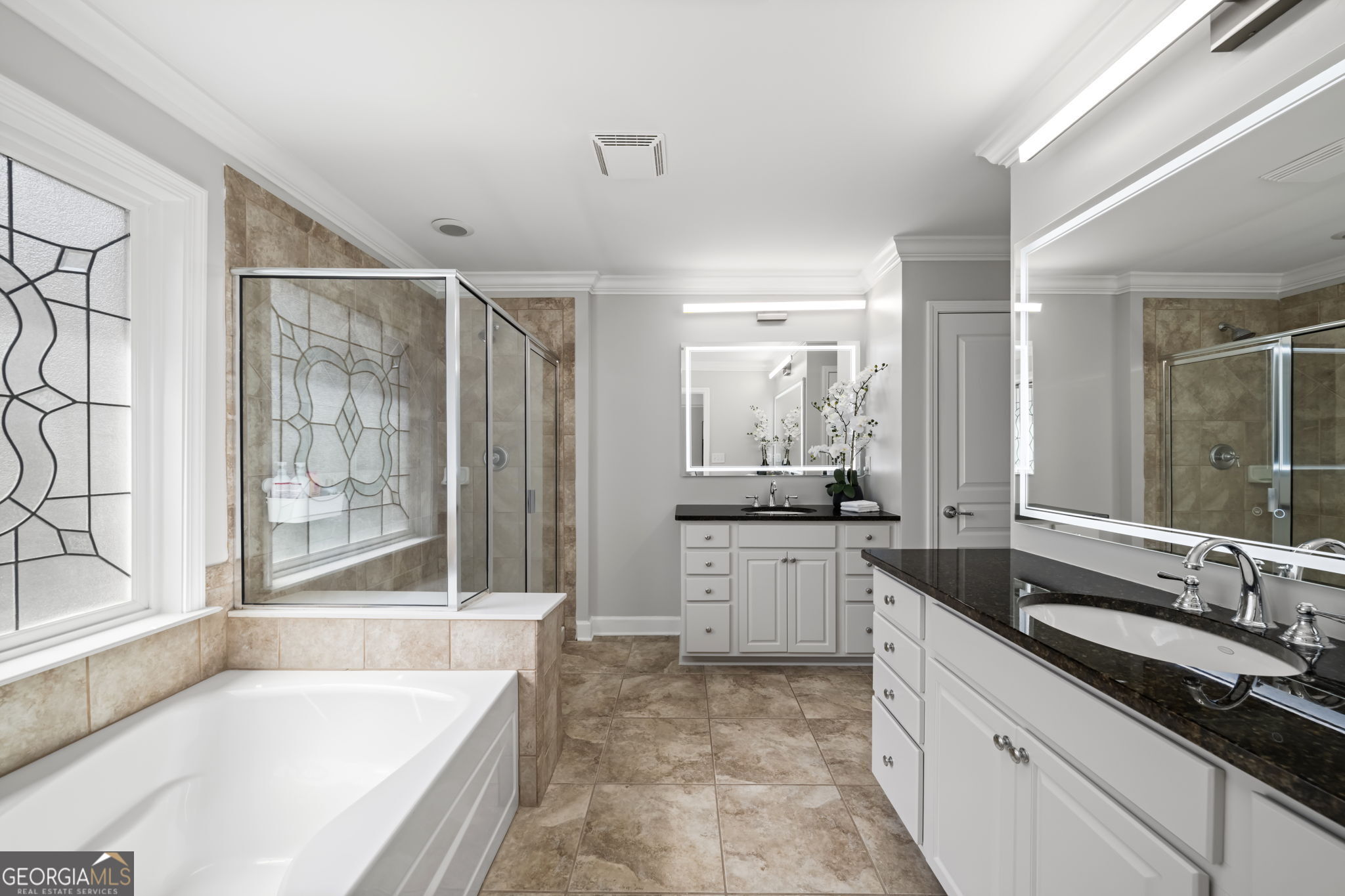 2872 Overlook Way Northeast Atlanta, GA 30324 - Photo 21 of 43 a large bathroom with a granite countertop tub sink shower and mirror