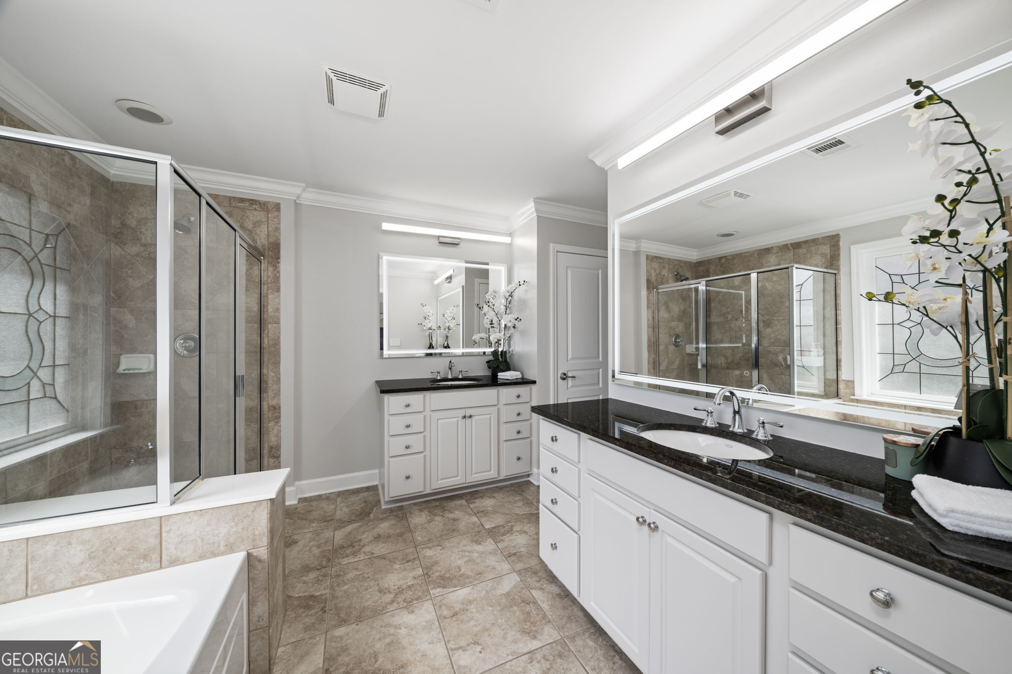 2872 Overlook Way Northeast Atlanta, GA 30324 - Photo 22 of 43 a large bathroom with a granite countertop tub sink shower and mirror