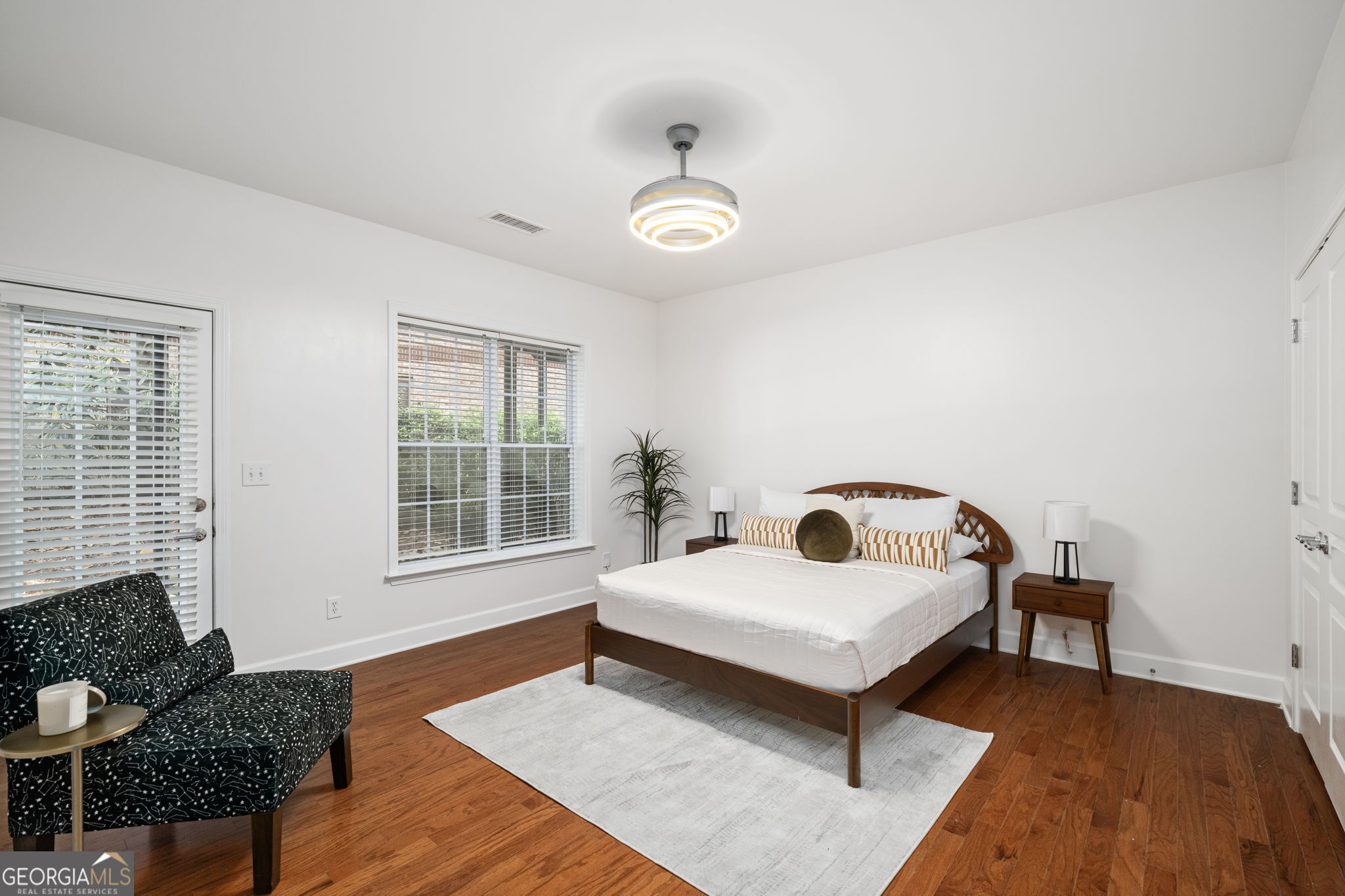 2872 Overlook Way Northeast Atlanta, GA 30324 - Photo 32 of 43 a bedroom with furniture and a window