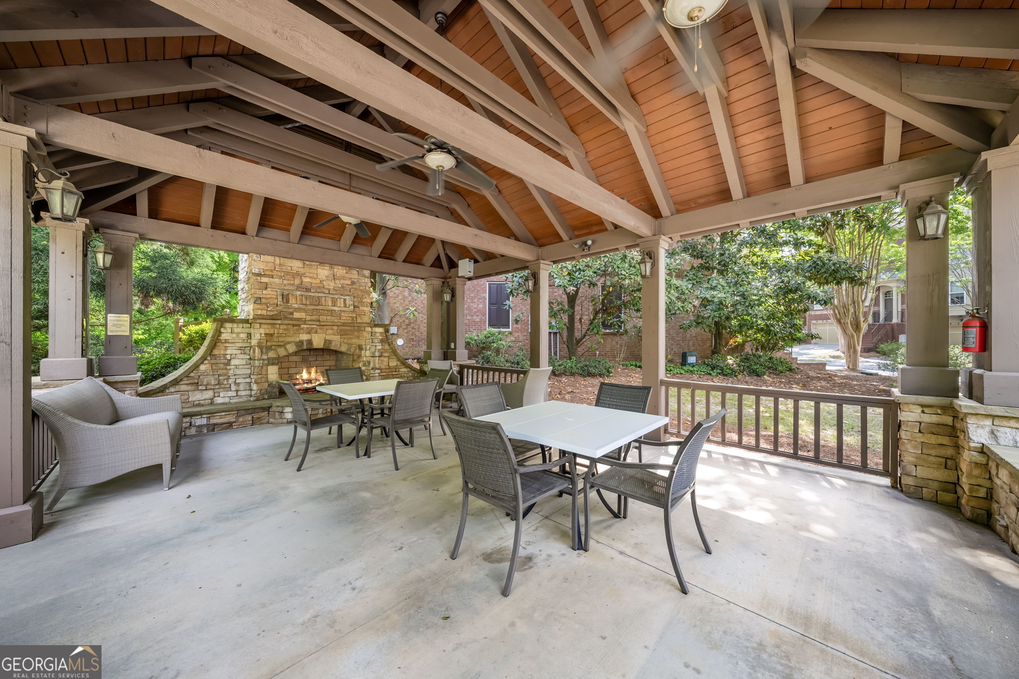 2872 Overlook Way Northeast Atlanta, GA 30324 - Photo 41 of 43 a view of a patio with a table chairs and a backyard